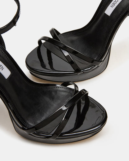JUNI Black Patent Criss Cross Stiletto Ankle Strap Women's Heel | Steve Madden