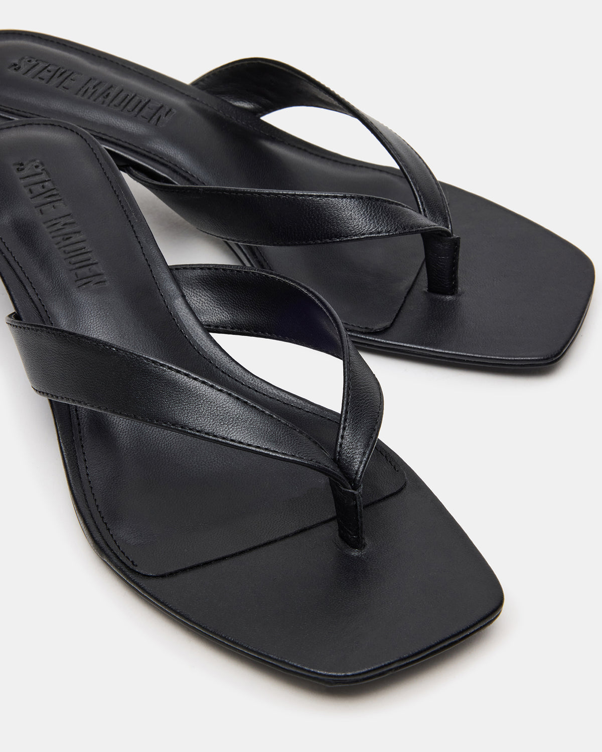 TRACIE Black Leather Thong Strap Women's Kitten Heel | Steve Madden