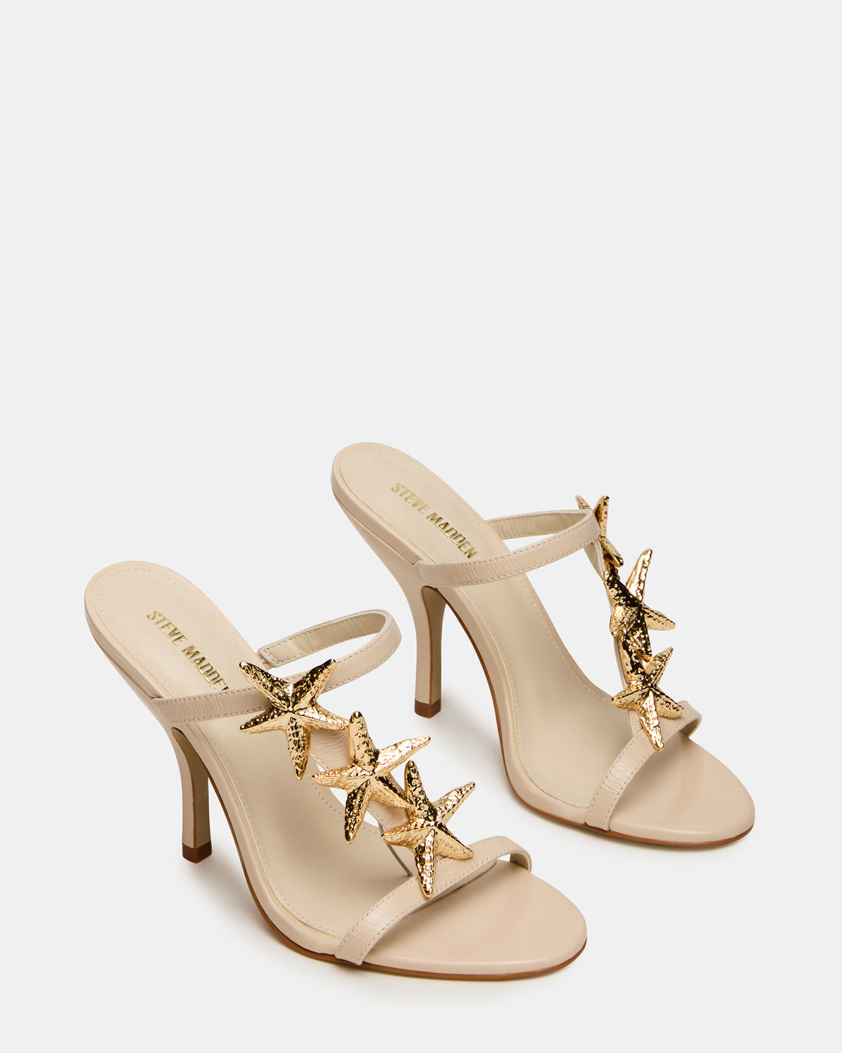 AQUARIAN Bone Star-Detail Round-Toe Mule Women's Heel | Steve Madden