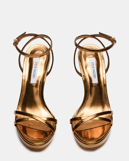 JUNI Bronze Criss Cross Stiletto Ankle Strap Women's Heel | Steve Madden