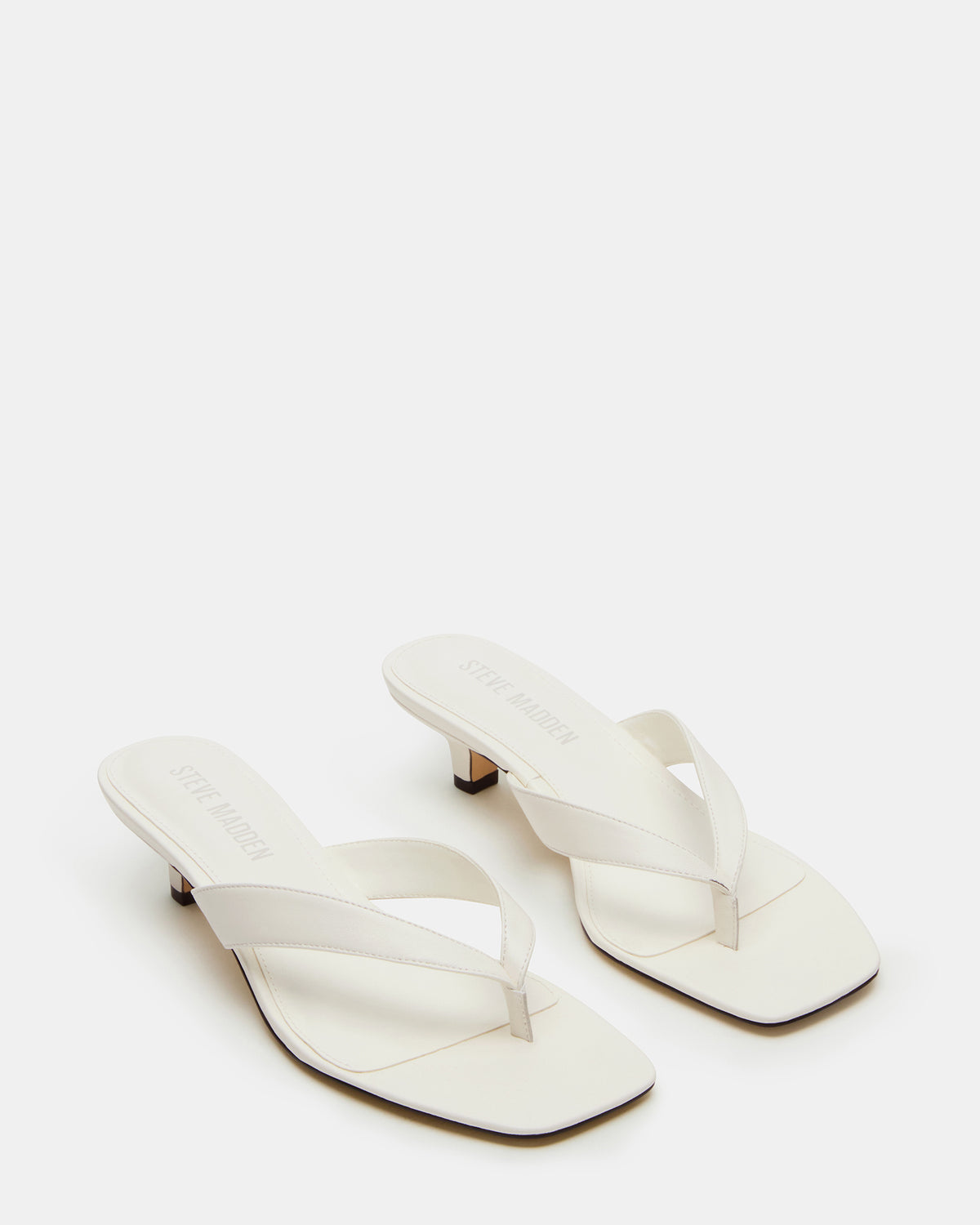 TRACIE White Leather Thong Strap Women's Kitten Heel | Steve Madden