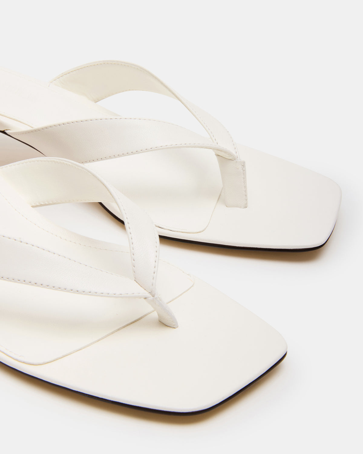 TRACIE White Leather Thong Strap Women's Kitten Heel | Steve Madden