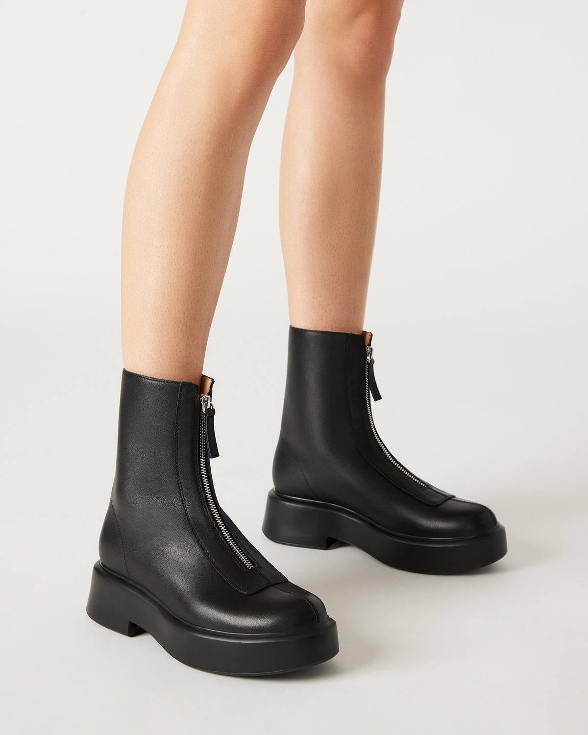 JONES Black Leather Zipper Lug Women's Ankle Boot | Steve Madden