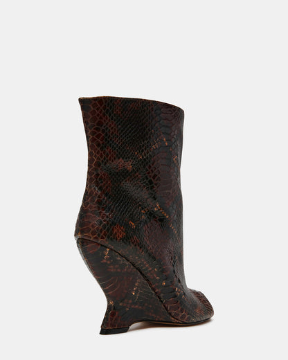 RYLIX Brown Snake Wedge Peep-Toe Women's Ankle Boot | Steve Madden
