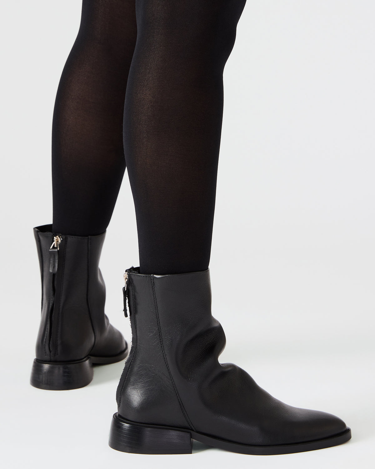 NEXIE Black Leather Women's Pointed-Toe Ankle Boot | Steve Madden