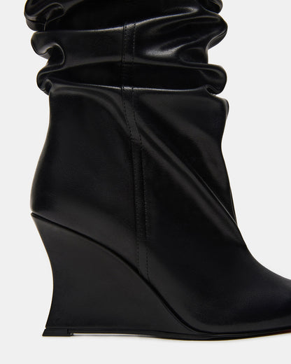 DISTORTION Black Pointed-Toe Scrunched Knee-High Wedge Women's Boot | Steve Madden