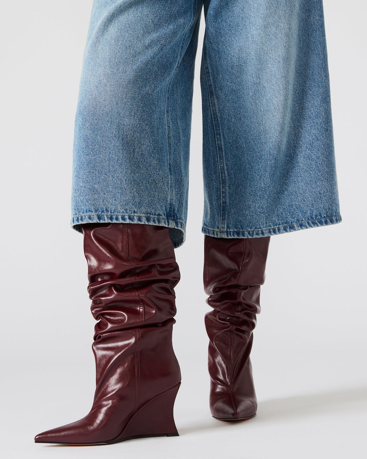 DISTORTION Burgundy Pointed-Toe Scrunched Knee-High Wedge Women's Boot | Steve Madden