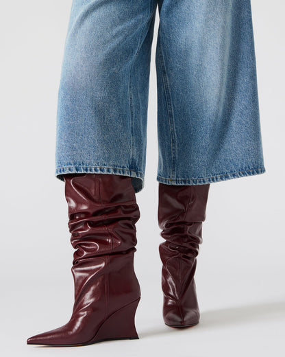 DISTORTION Burgundy Pointed-Toe Scrunched Knee-High Wedge Women's Boot | Steve Madden