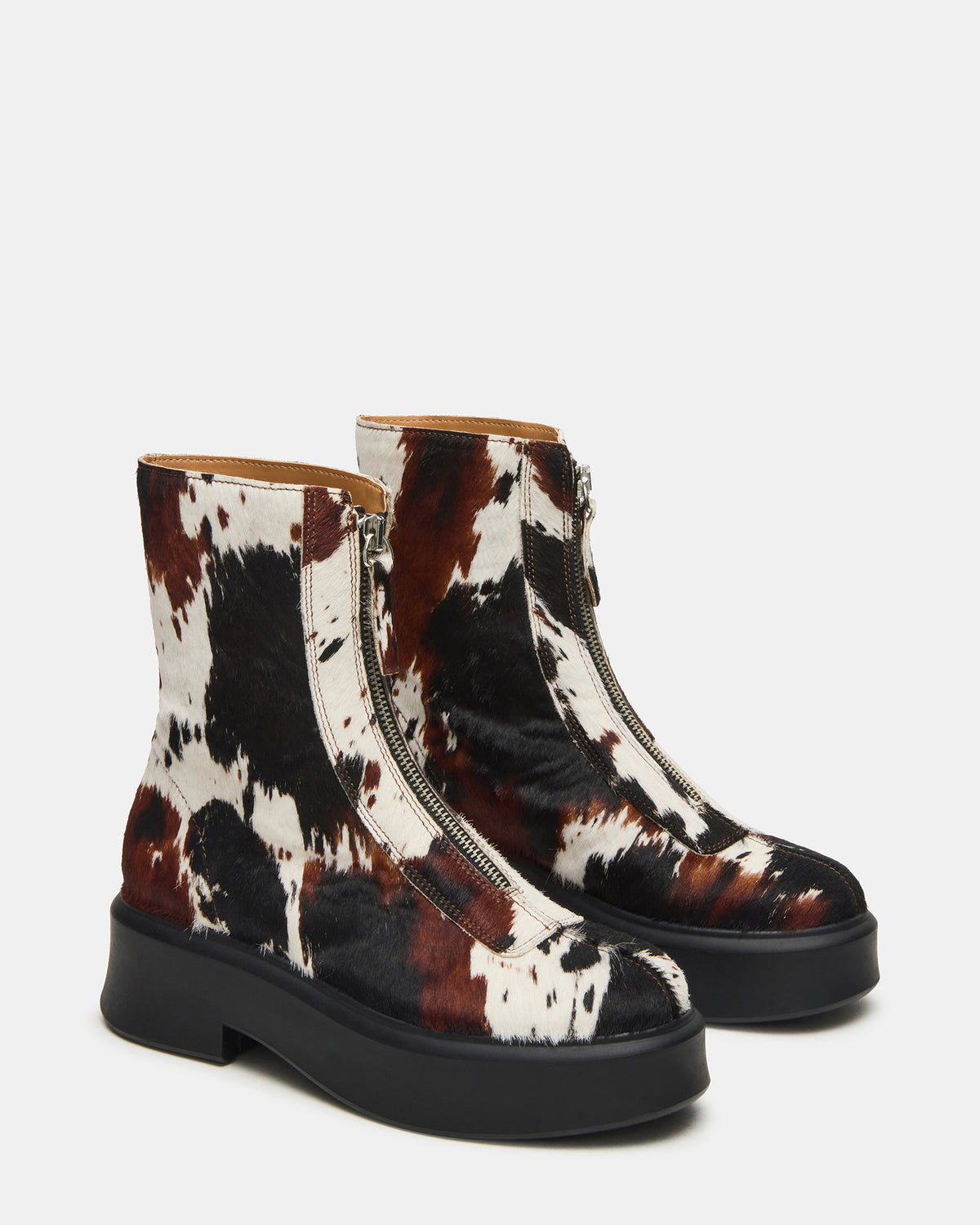 JONES Brown Cow Print Zipper Lug Women's Ankle Boot | Steve Madden