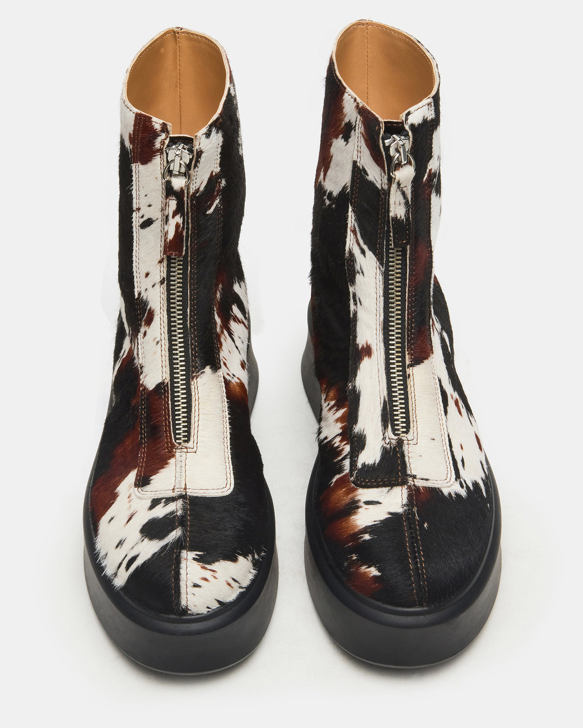 JONES Brown Cow Print Zipper Lug Women's Ankle Boot | Steve Madden