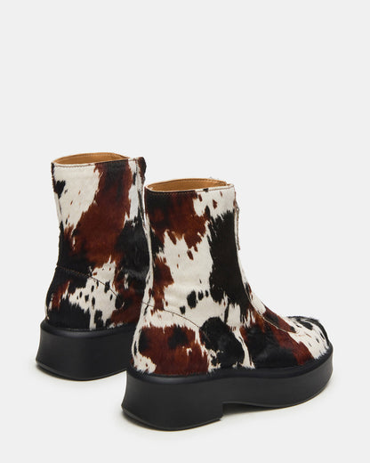 JONES Brown Cow Print Zipper Lug Women's Ankle Boot | Steve Madden