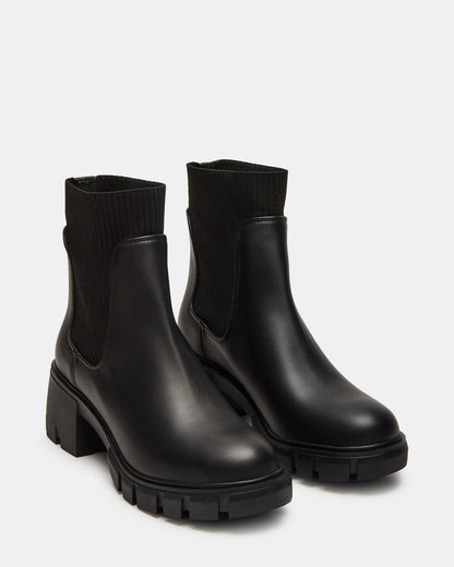 HUTCHH20 Black Water-Resistant Lug Sole Ankle Boot | Women's Booties | Steve Madden