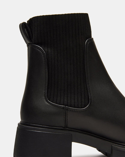 HUTCHH20 Black Water-Resistant Lug Sole Ankle Boot | Women's Booties | Steve Madden