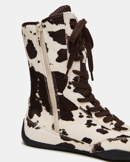 PAXTIN Brown Cow Print Women's High-Top Lace-Up Sneaker | Steve Madden