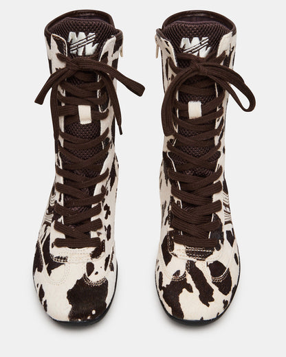 PAXTIN Brown Cow Print Women's High-Top Lace-Up Sneaker | Steve Madden