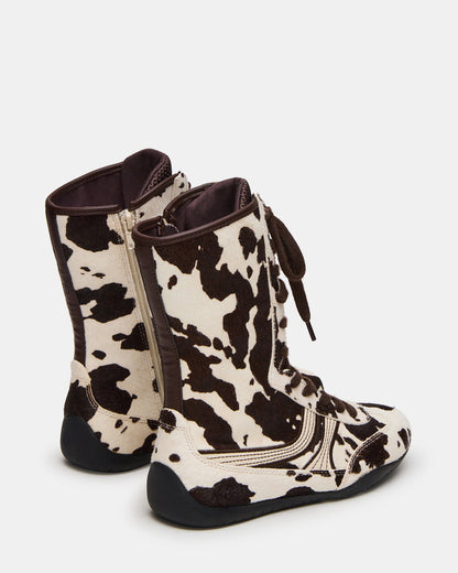 PAXTIN Brown Cow Print Women's High-Top Lace-Up Sneaker | Steve Madden
