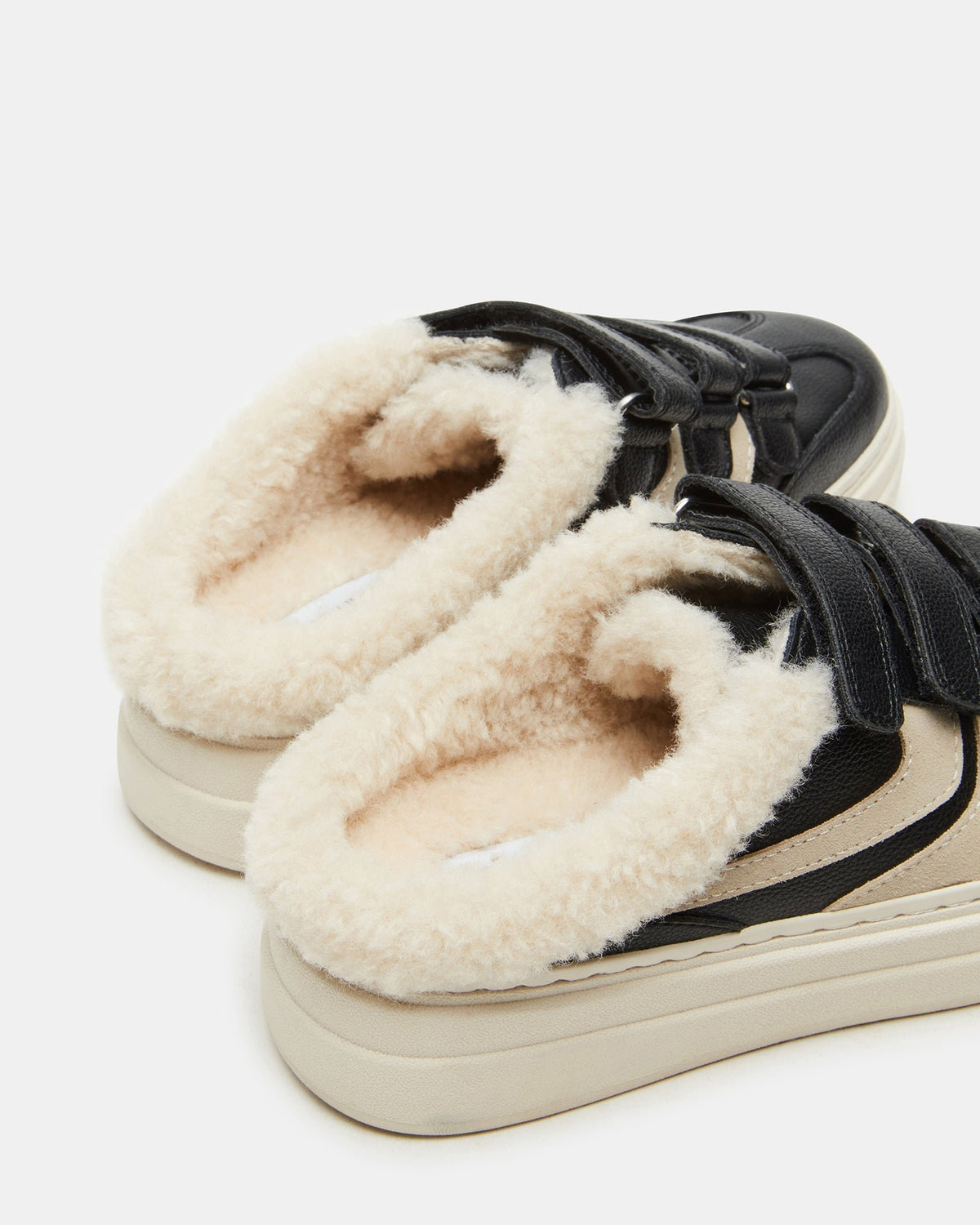 DASHER Black Low-Top Faux Fur Slip-On Sneaker | Women's Sneakers | Steve Madden