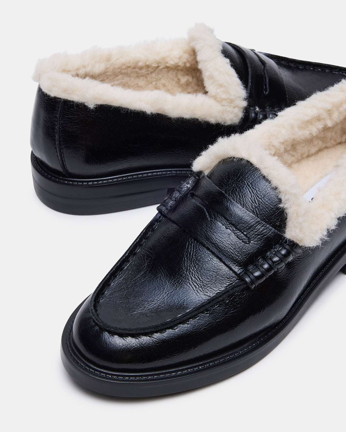 MADISON Faux Fur Black Leather Women's Penny Loafer | Steve Madden