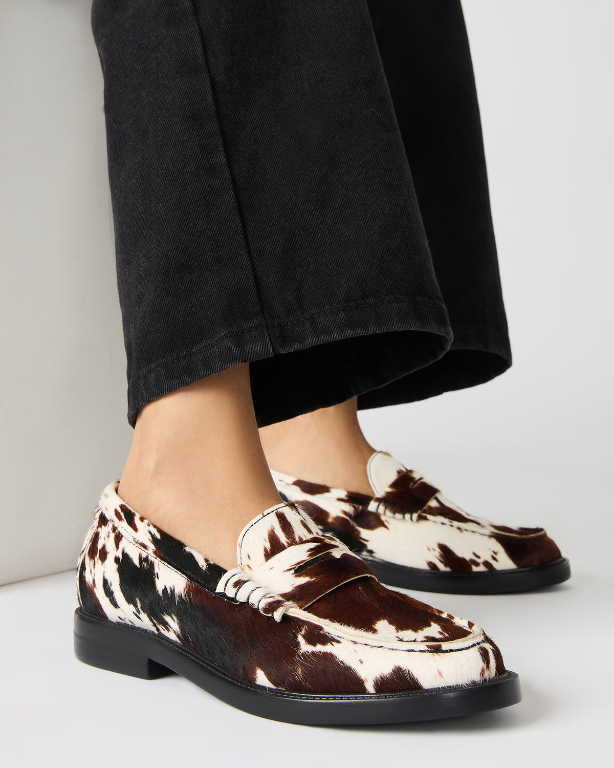 MADISON Brown Cow Print Women's Penny Loafer | Steve Madden