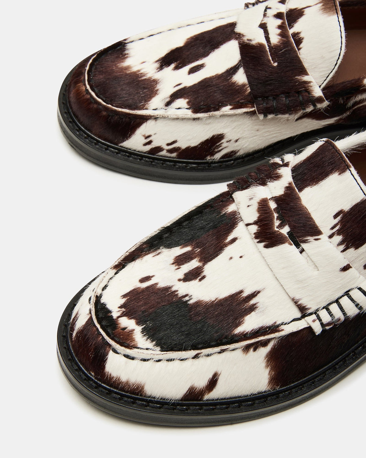 MADISON Brown Cow Print Women's Penny Loafer | Steve Madden