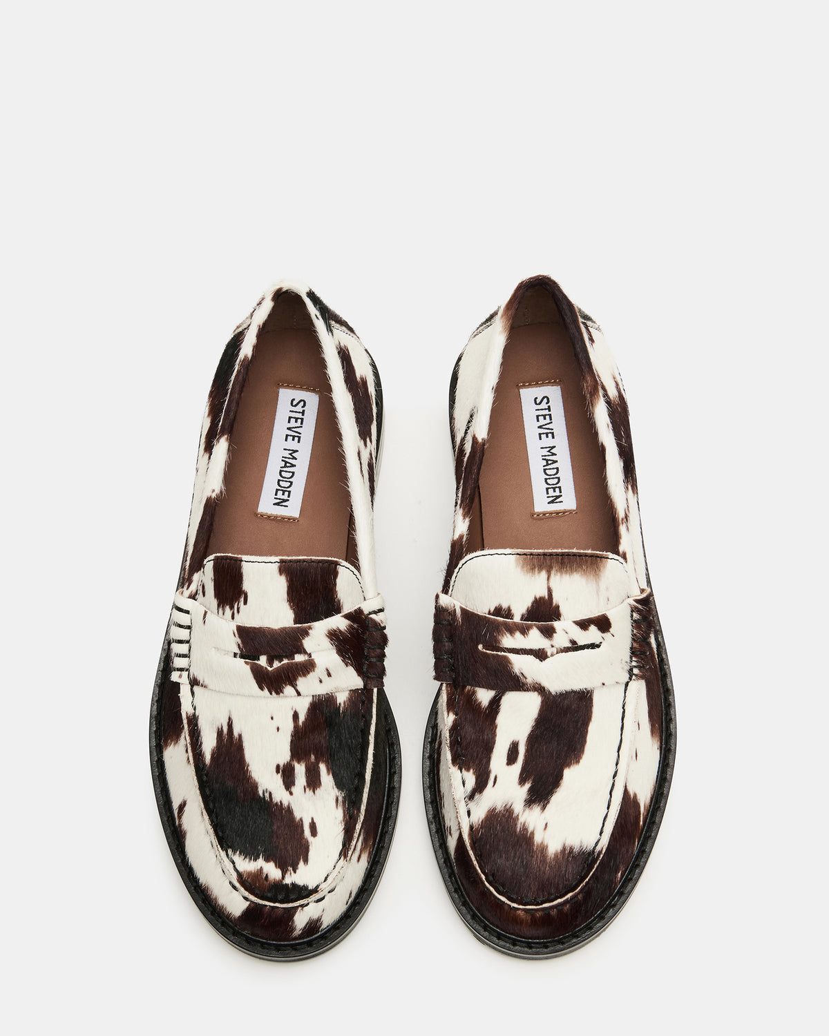 MADISON Brown Cow Print Women's Penny Loafer | Steve Madden