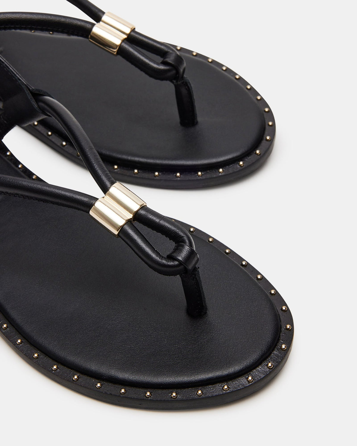 MEDUZA Black Leather Women's Studded Thong Sandal | Steve Madden