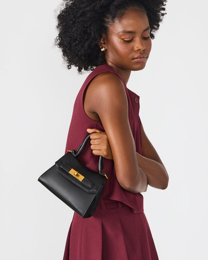 MADLYN Bag Black Structured Turn-Lock Closure Top-Handle Crossbody Mini Handbag | Steve Madden