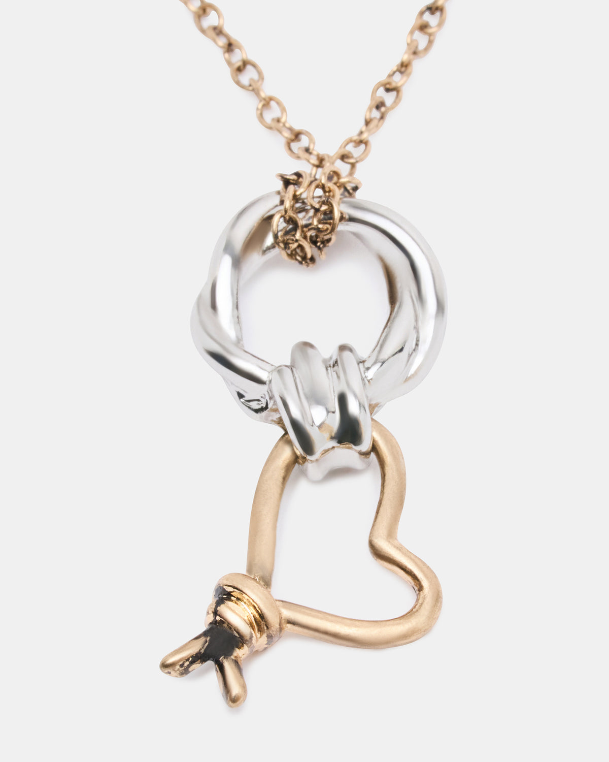 TWO TONE KNOT HEART PENDANT Necklace Double Knot Chain Necklace | Steve Madden