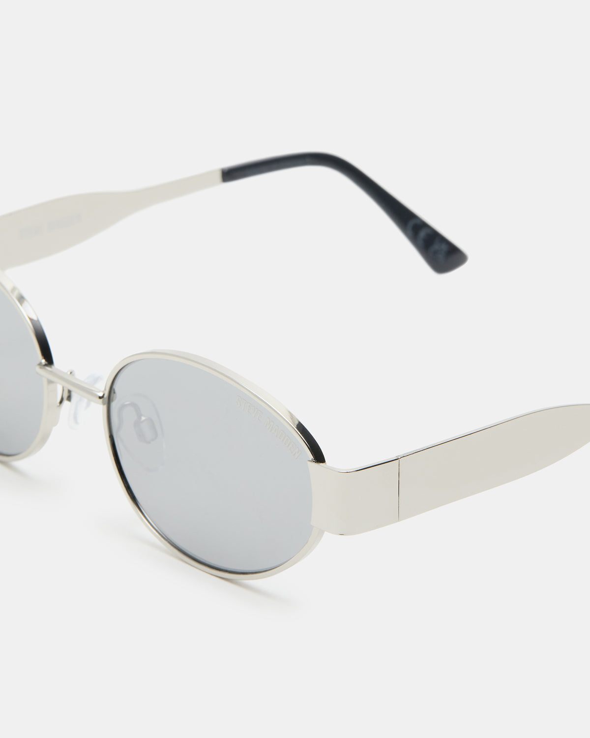 MYSTIE Shiny Silver Frame Oval Sunglasses | Steve Madden
