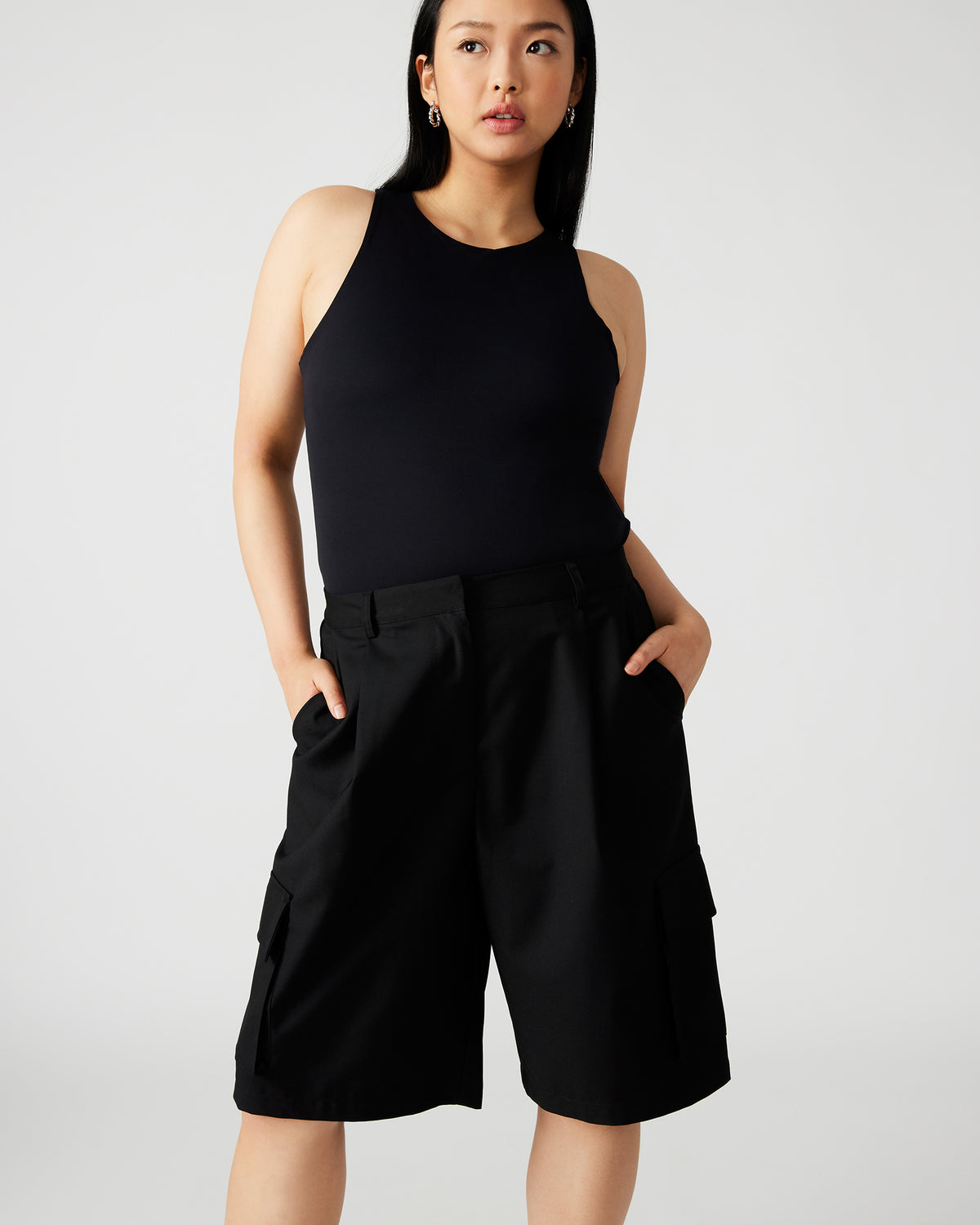 NICO Black Women's Contour Stretch Bodysuit | Steve Madden