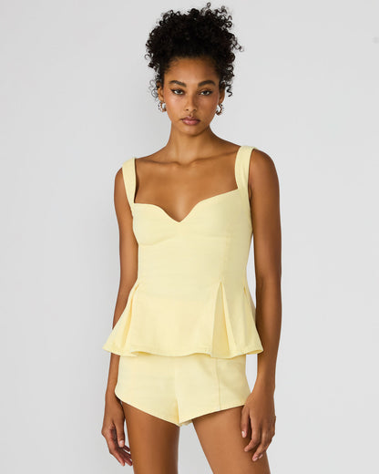 ZENIA Golden Glow Sleeveless Peplum Women's Top | Steve Madden